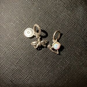 Two Pandora charms